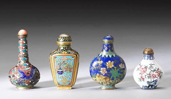 Appraisal: Four enameled metal snuff bottles The first of white ground