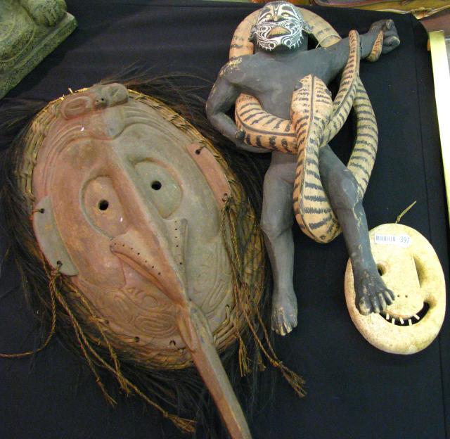 Appraisal: Three th century Papua New Guinea masks and puppet figures