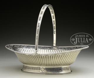 Appraisal: LARGE HANDLED SILVER CAKE BASKET BY WILLIAM PLUMMER The w