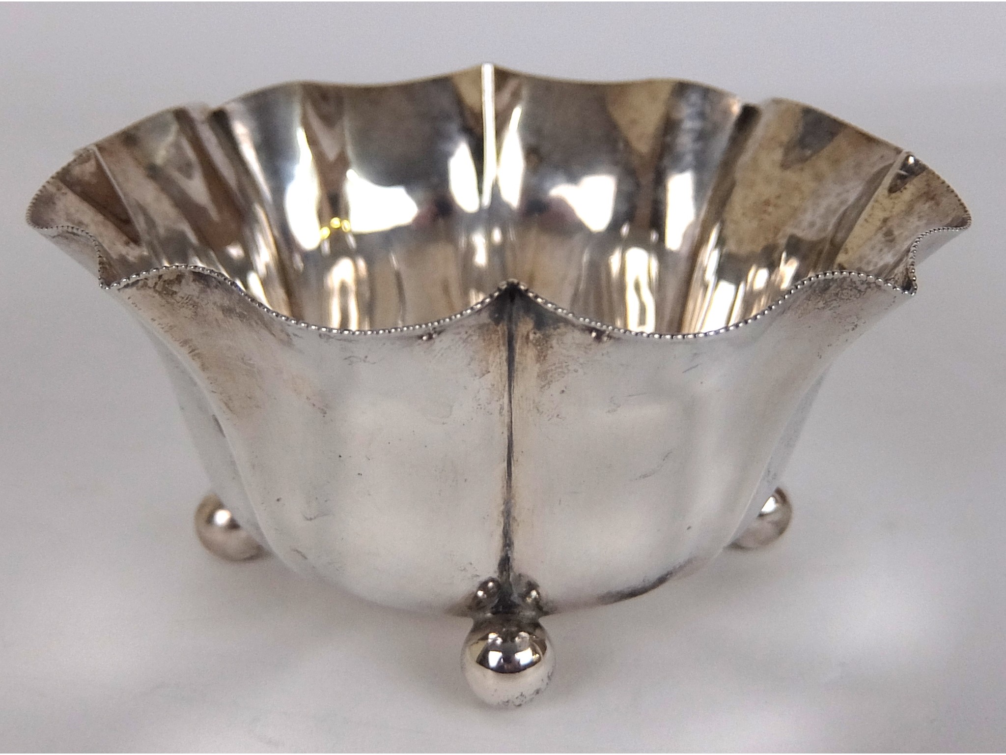 Appraisal: A silver rosebowlby Hamilton Inches Edinburgh of circular scalloped shape