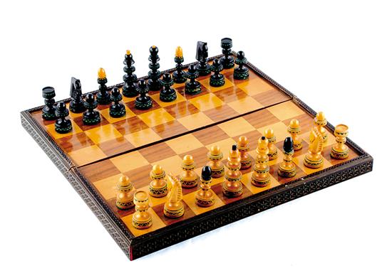 Appraisal: Gameboard and chess set th century carved hinged box with