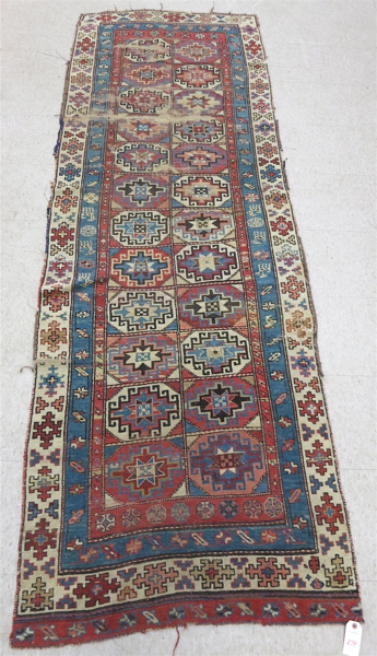 Appraisal: ANTIQUE CAUCASIAN RUNNER hand knotted in an overall geometric pattern