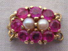 Appraisal: A carat gold and ruby clasp for either a single