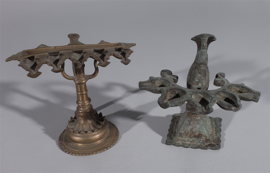 Appraisal: Pair of Indian multi-spouted oil lamps Both featuring spouts one