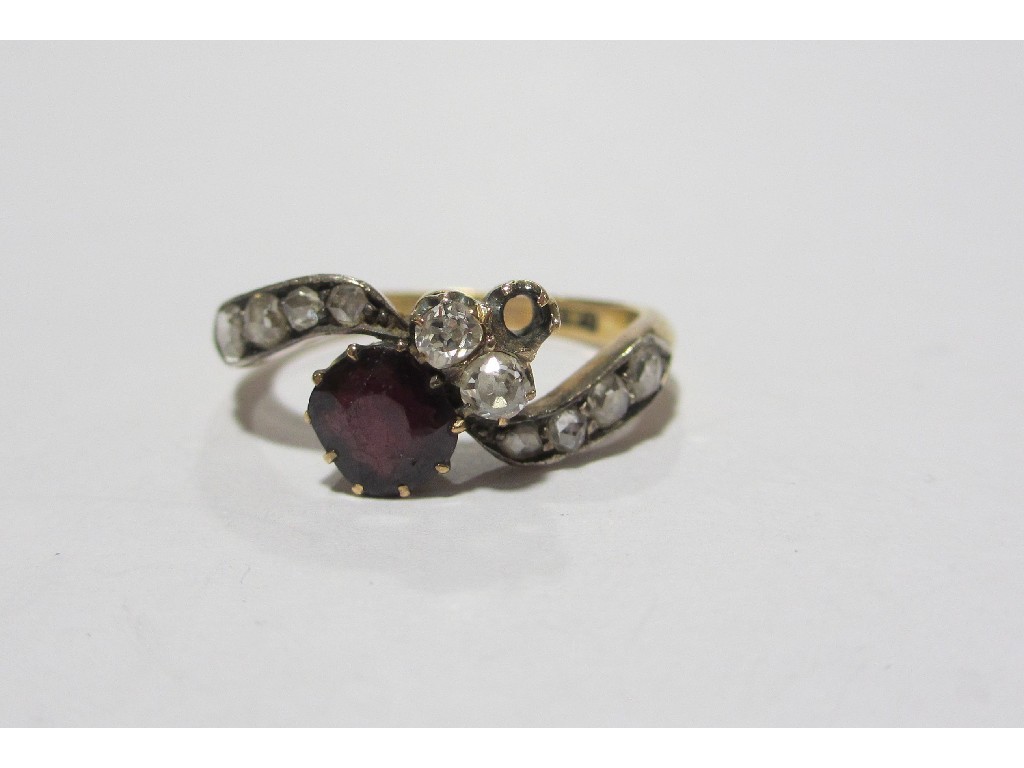 Appraisal: Edwardian ct gold garnet and diamond cross over ring stone