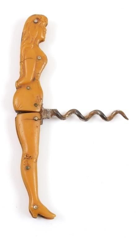 Appraisal: ANTIQUE GERMAN CELLULOID GIRL CORKSCREWSlightly tacky German celluloid handled corkscrew