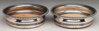 Appraisal: PAIR OF ENGLISH REGENCY DECANTER COASTERS The silver plated and