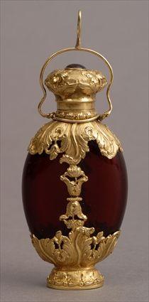 Appraisal: CONTINENTAL GOLD-MOUNTED RUBY GLASS SCENT BOTTLE MADE FOR THE EASTERN