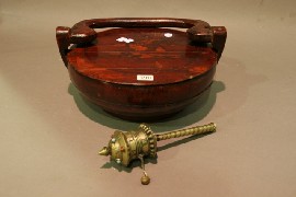 Appraisal: A Nepalese praying wheel in brass together with a wooden