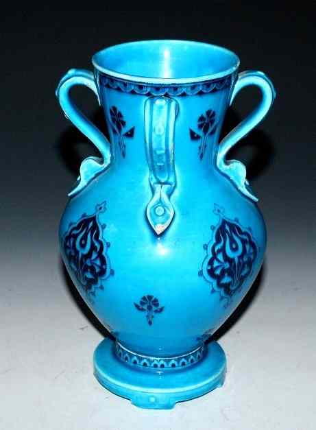 Appraisal: A MINTONS EASTERN STYLE TURQUOISE VASE four strap handles and