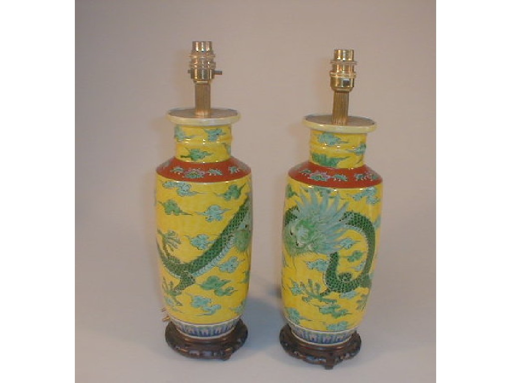 Appraisal: A pair of Chinese pottery vase table lamps enamelled with