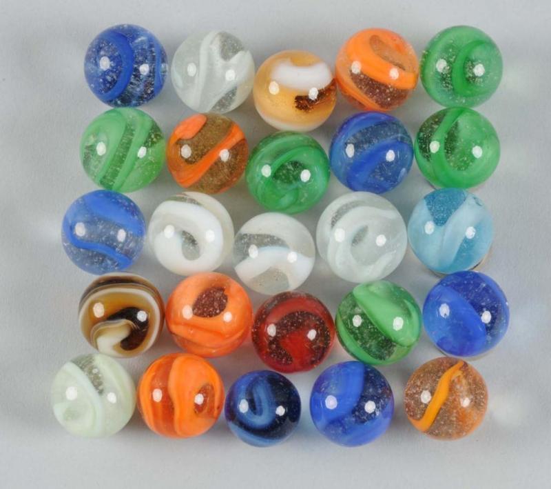 Appraisal: Lot of Machine-Made Swirl Marbles Description Possibly made by Akro