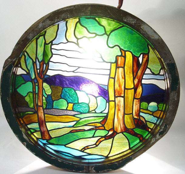 Appraisal: Circular 's stained glass window with wooden frame the colour