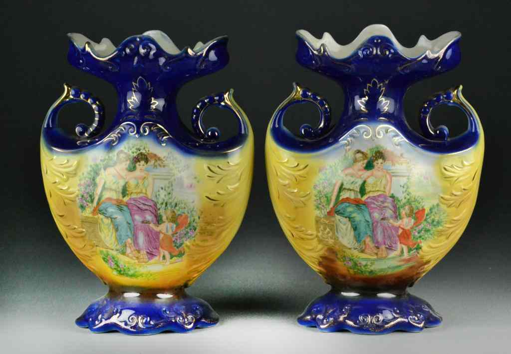 Appraisal: Pair of Victoriaware Ironstone VasesDepicting two beauties and a musician