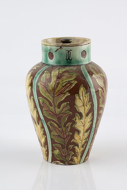 Appraisal: Della Robbia PotteryJar and cover circa incised with stylised foliage