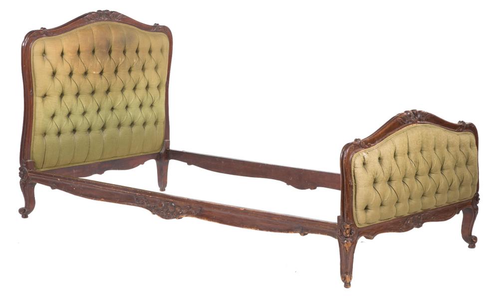 Appraisal: Pair of Provincial Louis XV-Style Walnut Single Beds arched foliate