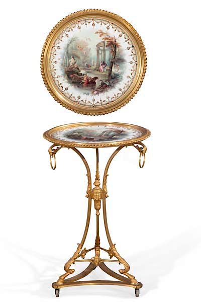 Appraisal: A French bronze jeweled porcelain gueridon A French gilt bronze