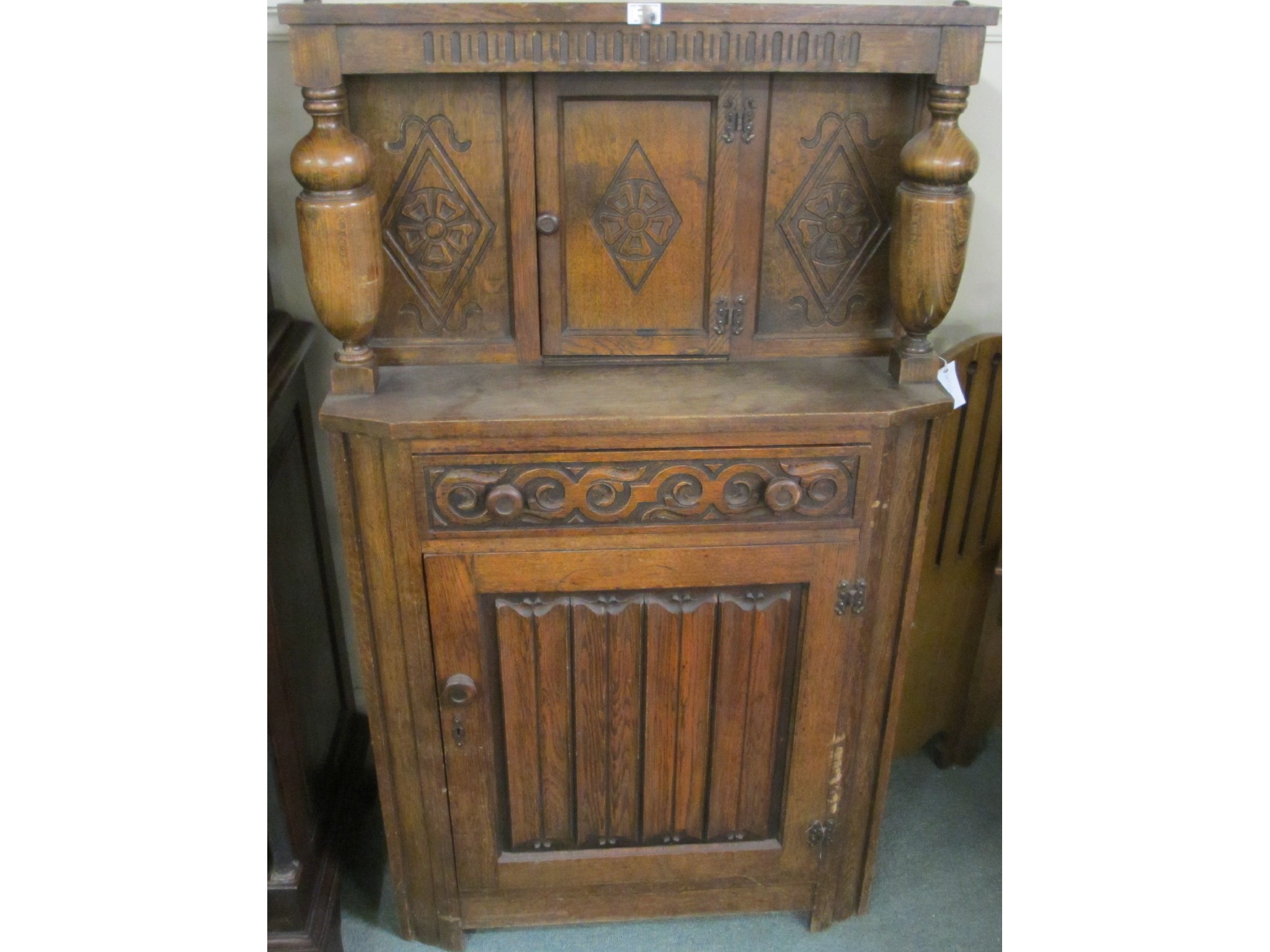 Appraisal: An oak linen hall cabinet