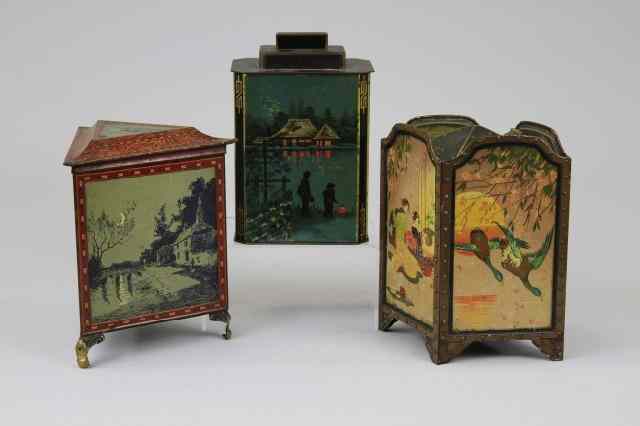 Appraisal: THREE HUNTLEY PALMERS SHAPED BISCUIT TINS Lithographed tinplate Comprising a