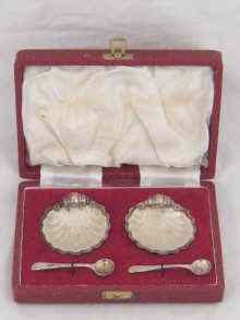 Appraisal: A pair of hallmarked silver shell salts with clear glass