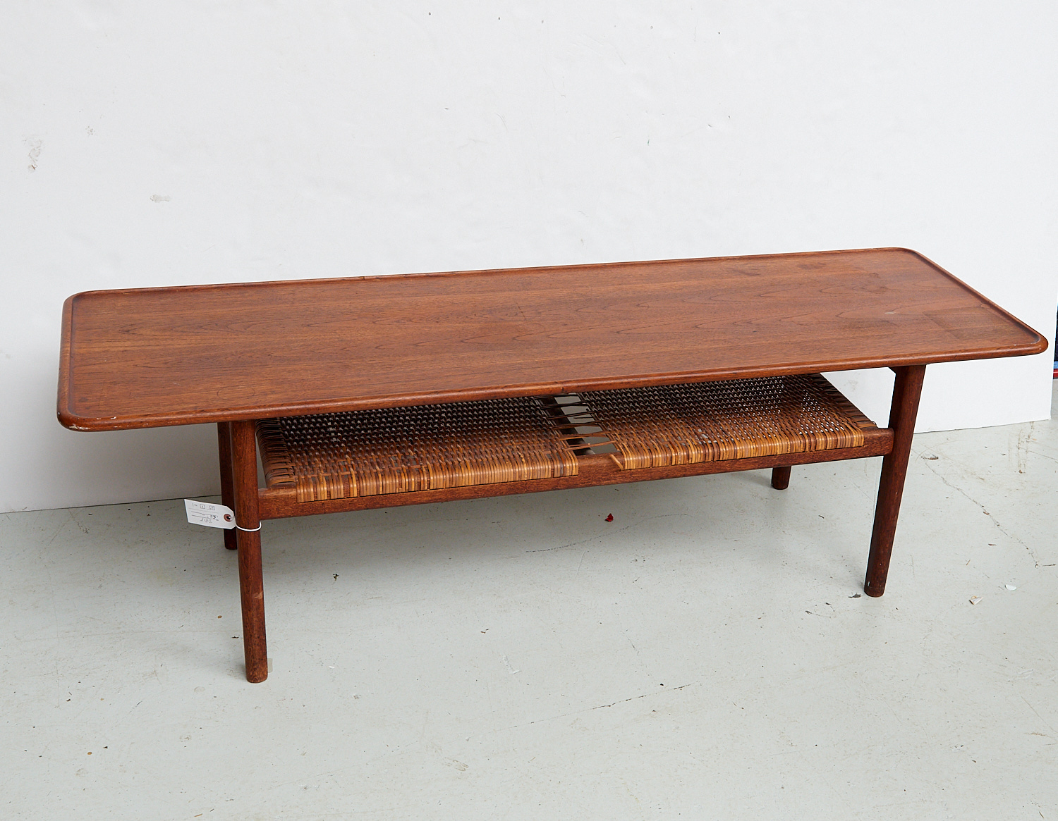 Appraisal: DANISH MODERN TEAK AND RATTAN COFFEE TABLE Mid th c