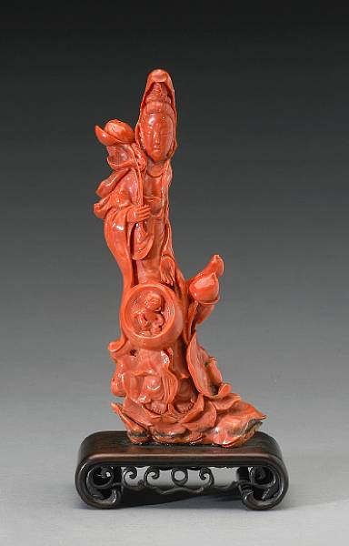 Appraisal: A coral figure of Kannon as 'Compassionate Mother' Inspired by