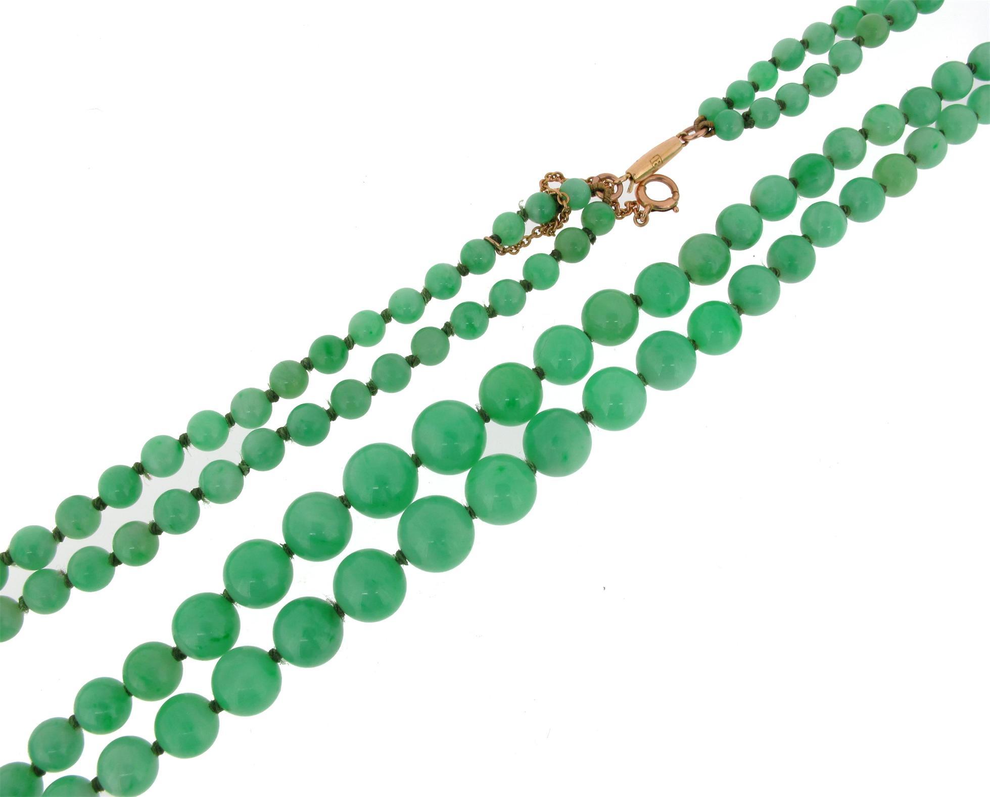 Appraisal: A graduated two row jade bead necklace