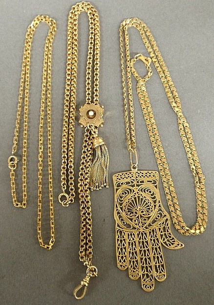 Appraisal: - Three tested gold chains one with slide one with