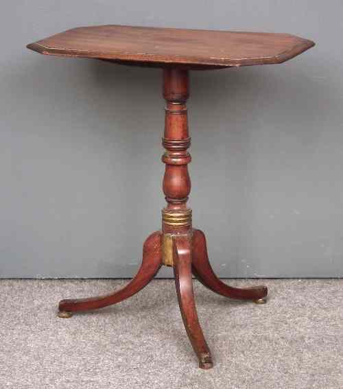 Appraisal: A late Georgian mahogany octagonal tripod table on turned and