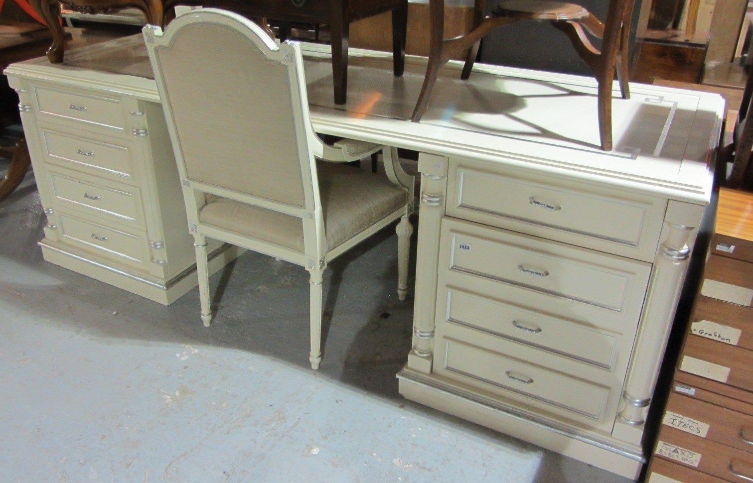 Appraisal: A large th century cream painted pedestal desk and similar