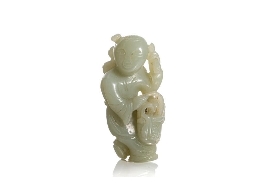 Appraisal: Chinese carved celadon jade as a boy holding a basket