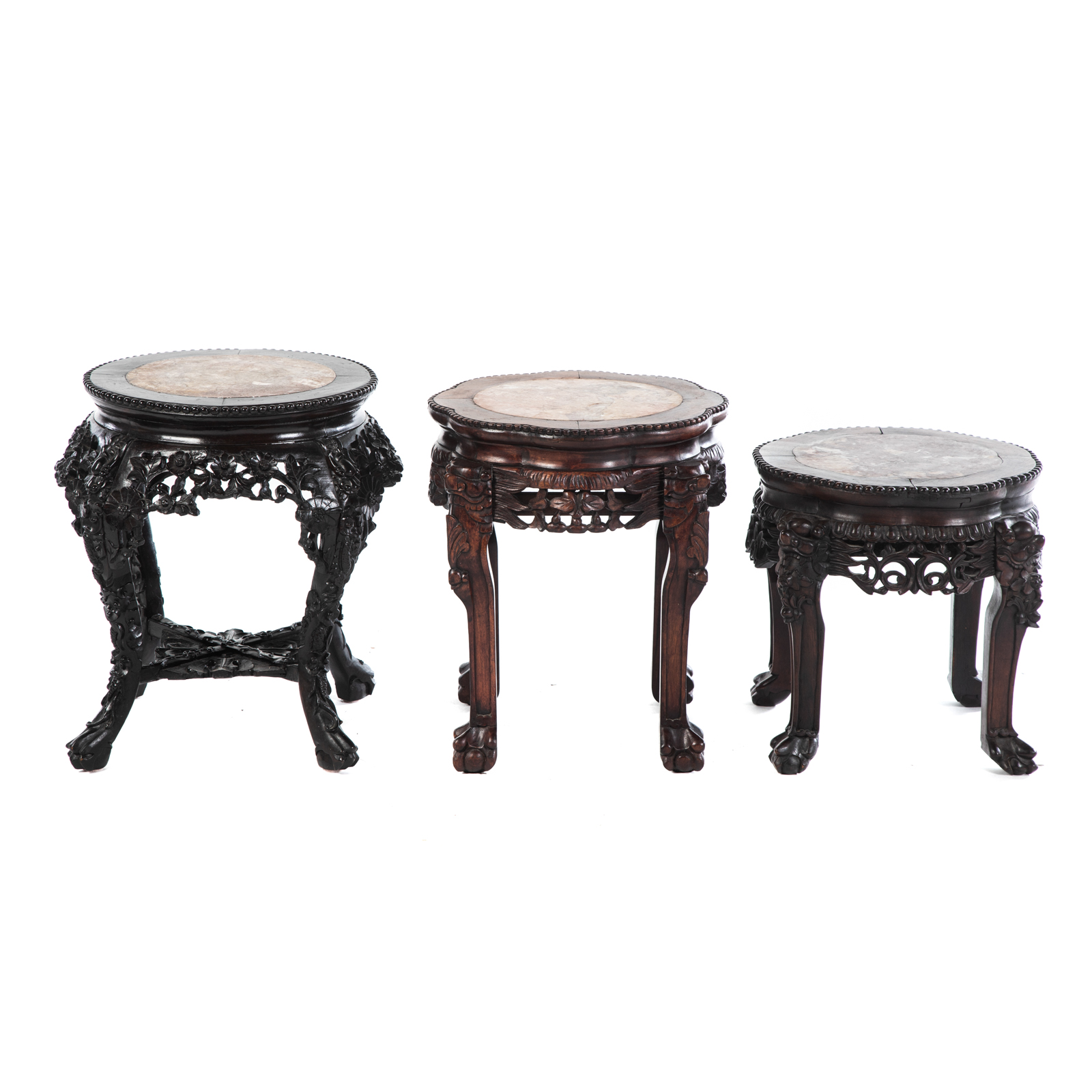 Appraisal: THREE CHINESE CARVED ROSEWOOD TABOURETS First quarter- th century elaborately