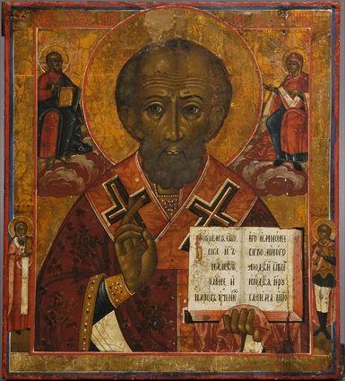 Appraisal: RUSSIAN PAINTED WOOD ICON Showing a cleric saint with right