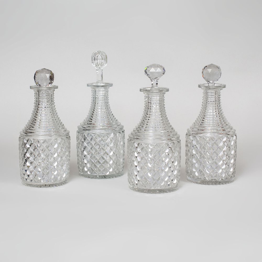 Appraisal: Set of Four Cut Glass Decanters and Four Stoppers The