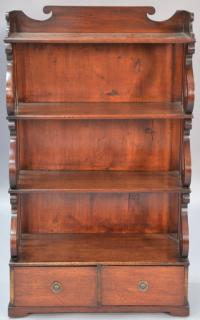 Appraisal: George III mahogany book stand with shelves over two drawers