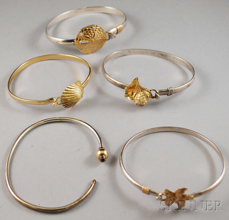 Appraisal: Five Sterling Silver and kt Gold Bangles four with sea