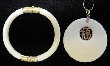 Appraisal: karat yellow gold ivory bangle bracelet and pendantIncluding karat yellow