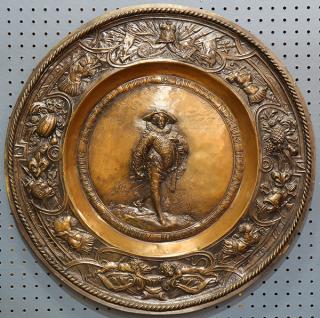 Appraisal: Continental style relief decorated and patinated wall plaque Continental style