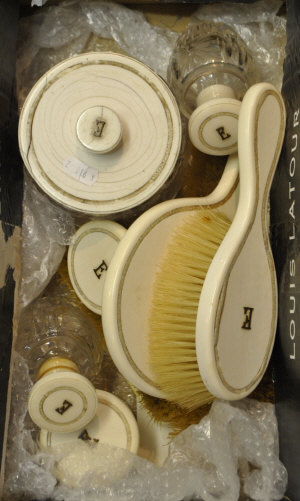 Appraisal: A th century twelve piece ivory dressing set including glass