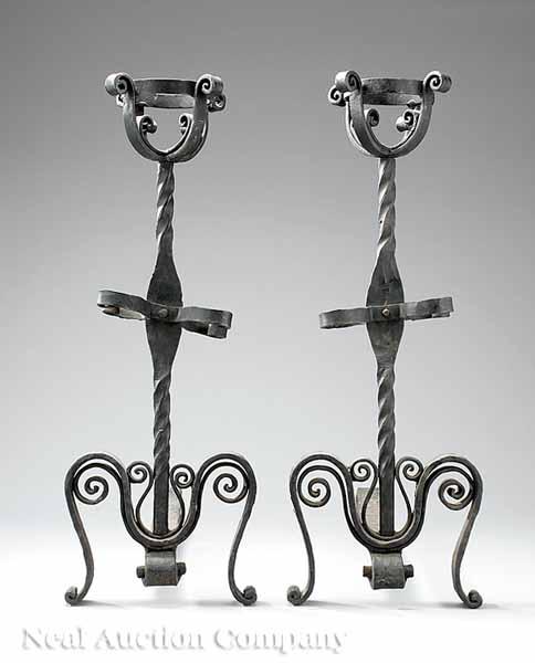 Appraisal: A Pair of Continental Wrought Iron Andirons cup finials on