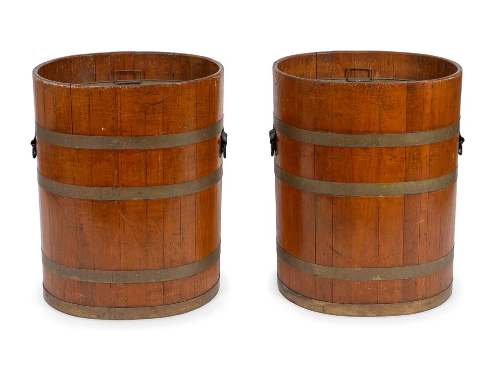 Appraisal: A Pair of Chinese Brass Bound Rice Barrels Height x