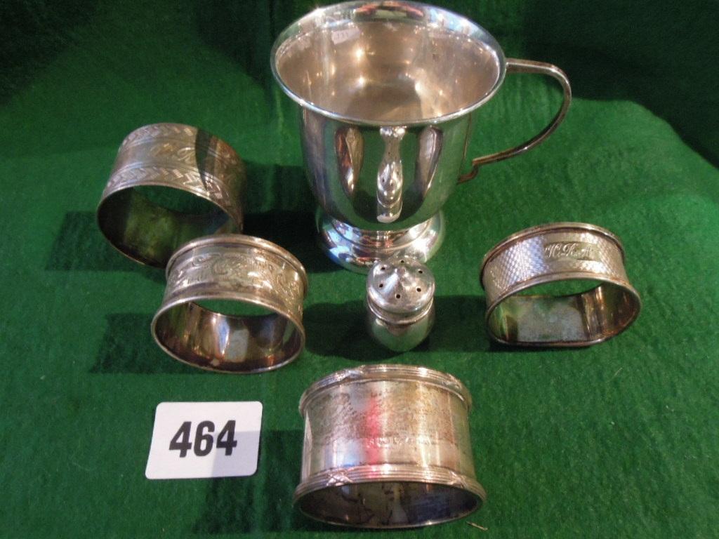 Appraisal: A silver christening beaker Sheffield four napkin rings and a