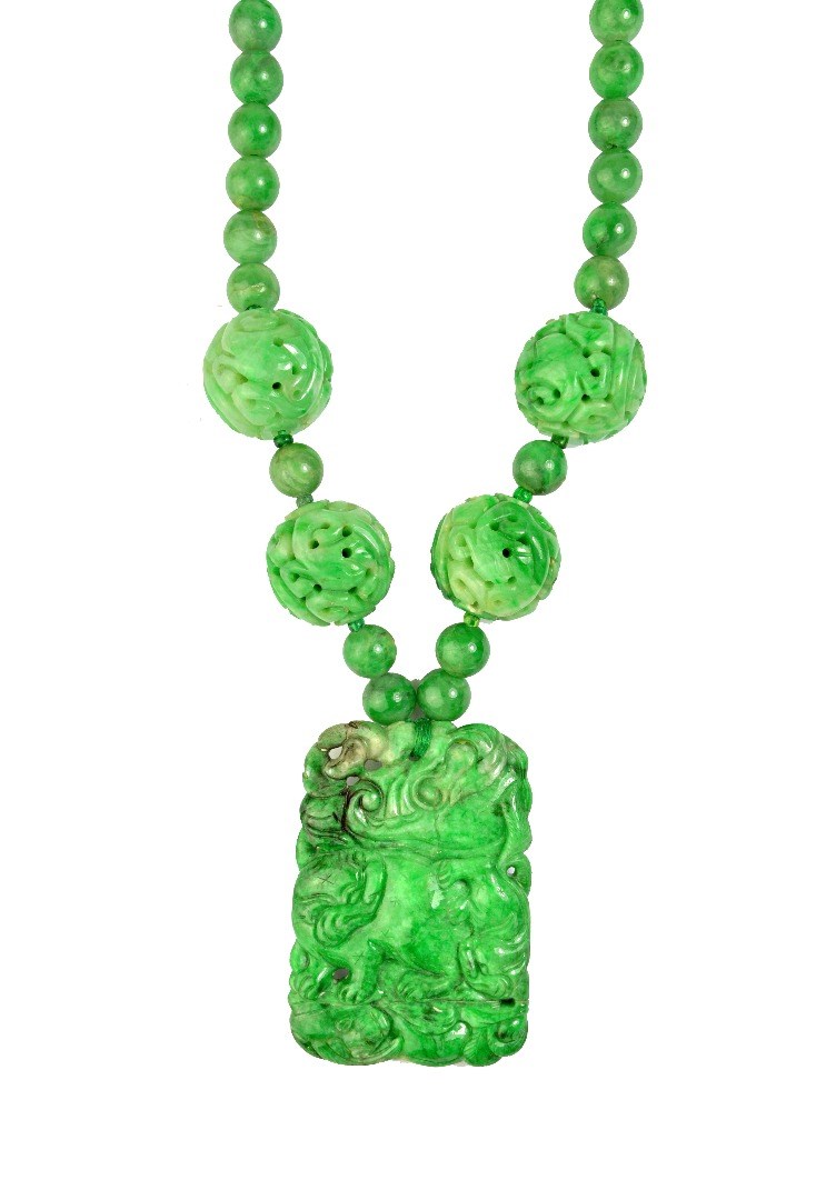 Appraisal: A Chinese carved jade necklace the front with a large