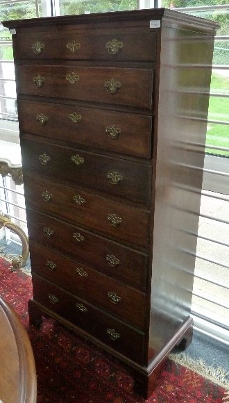 Appraisal: A George III mahogany chest of eight long drawers with