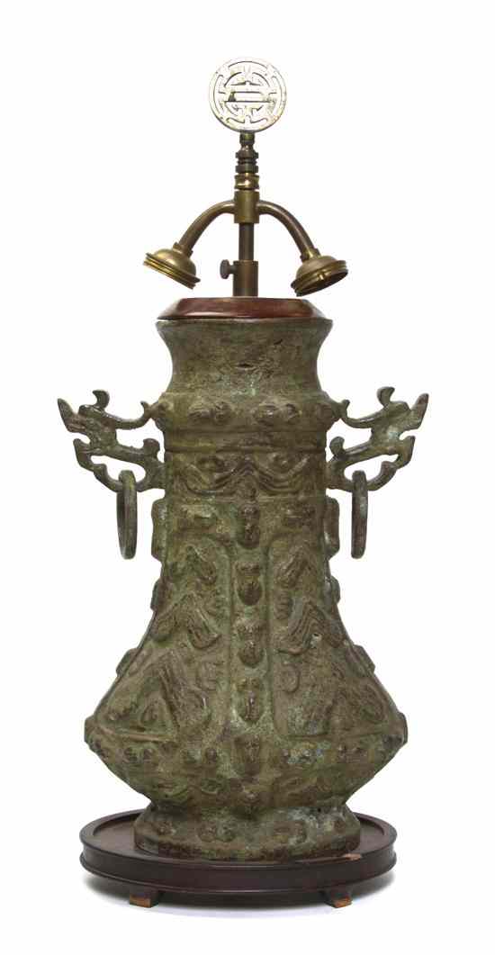 Appraisal: A Chinese Archaistic Style Bronze Vase with dragon head form