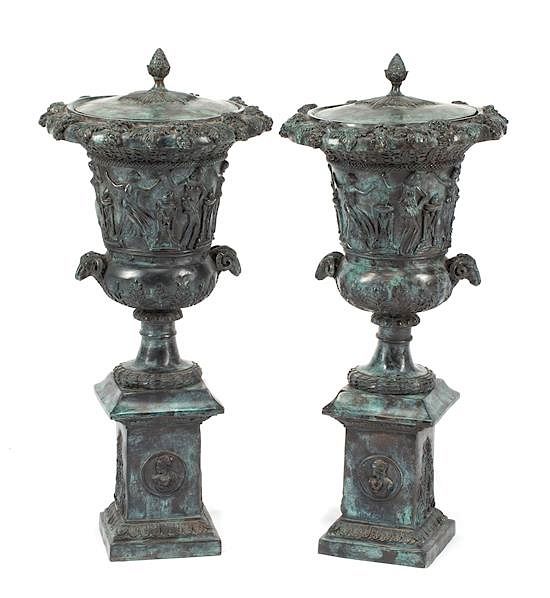 Appraisal: A Pair of Pompeiian Style Patinated Bronze Covered Urns Height