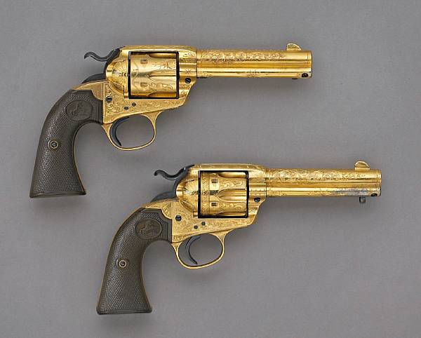 Appraisal: A pair of custom engraved Colt Bisley Model single action