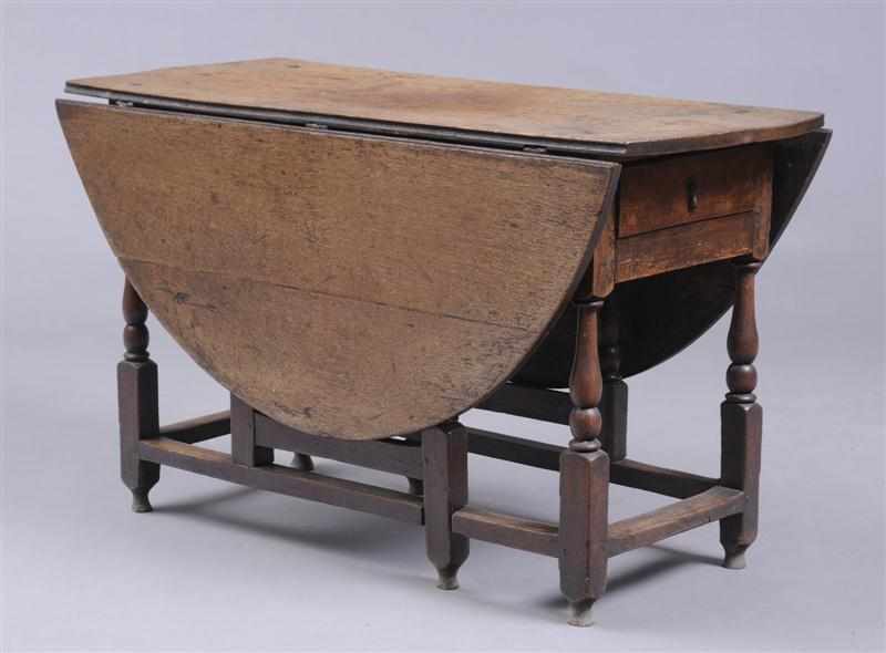 Appraisal: CHARLES II OAK GATELEG TABLE The top with bowed ends