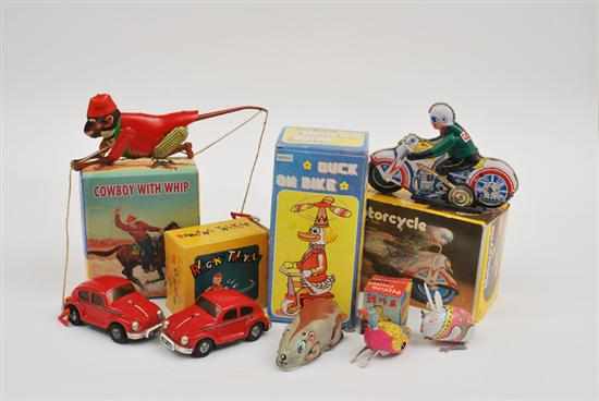 Appraisal: COLLECTION OF TINPLATE INCLUDING CLIMBING MONKEY BOXED COWBOY WITH WHIP