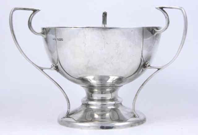 Appraisal: A silver three-handled presentation cup James Dixon and Son Sheffield